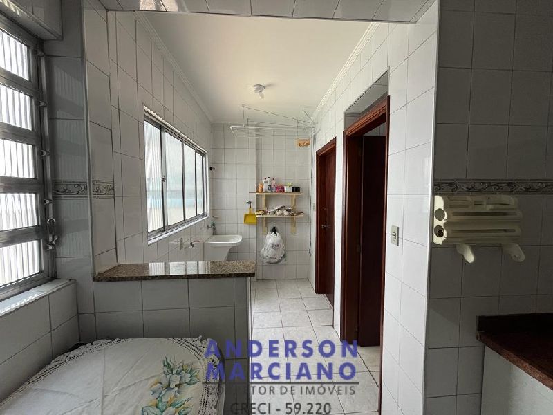 Apartamento central 2 dormitórios (1 suíte)