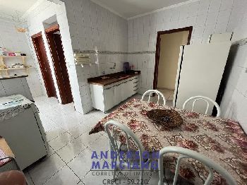 Apartamento central 2 dormitórios (1 suíte)